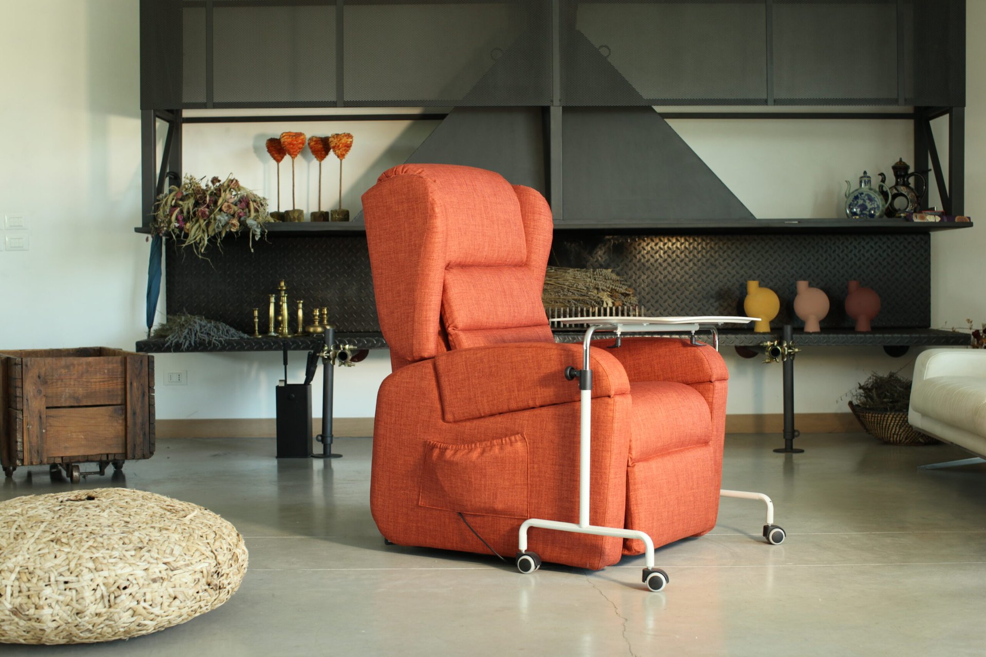 Electric recliner chair with multifunction table in a showroom