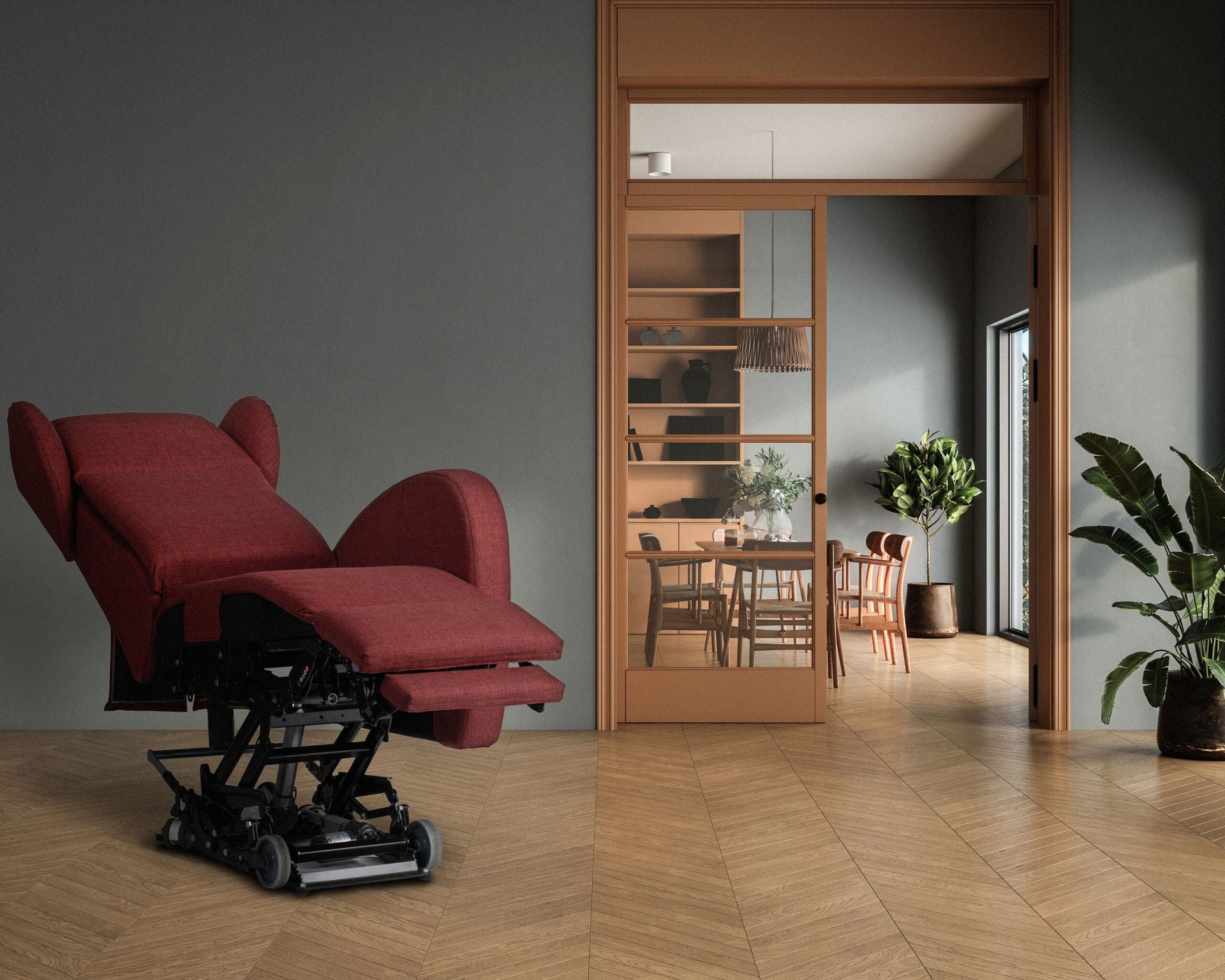 Electric care chair lifted on its hi-lo mechanism in a living room